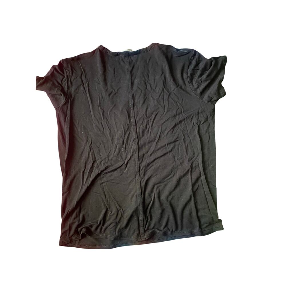 The row black blouse.